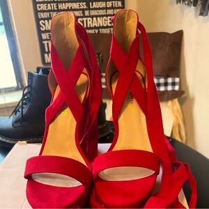Chunky lace up red heels. These are brand new never worn.